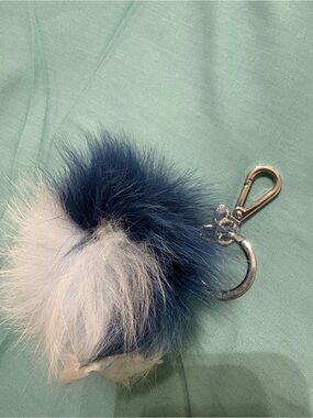 NWOT Michael Kors Fur Pom Keychain two-tone blue.